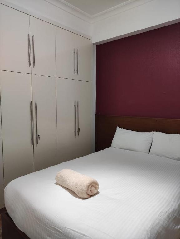 Postel nebo postele na pokoji v ubytování E-Just Hotel Borg El Arab