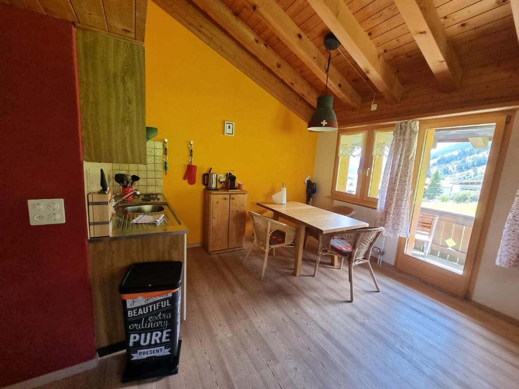 Kuchyň nebo kuchyňský kout v ubytování Cute attic apartment in the heart of the mountains