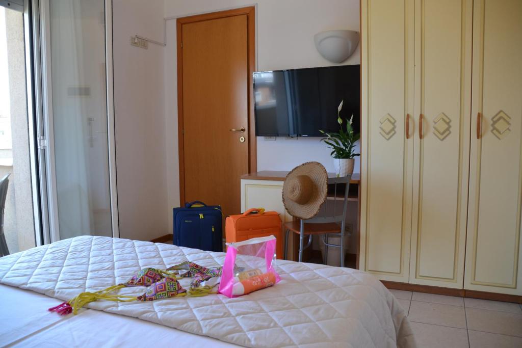 Postel nebo postele na pokoji v ubytování Hotel Apogeo - Breakfast Experience