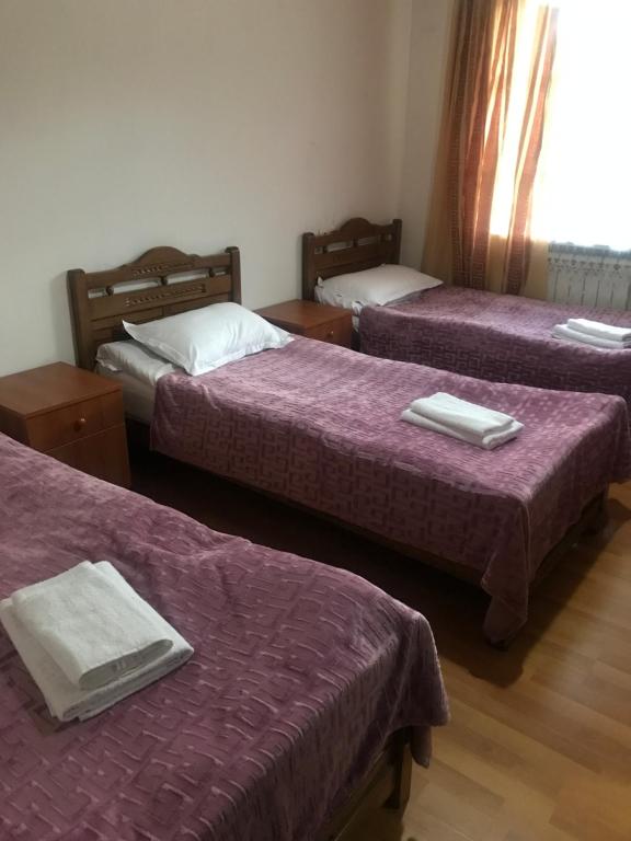 Postel nebo postele na pokoji v ubytování Guest House Gogia