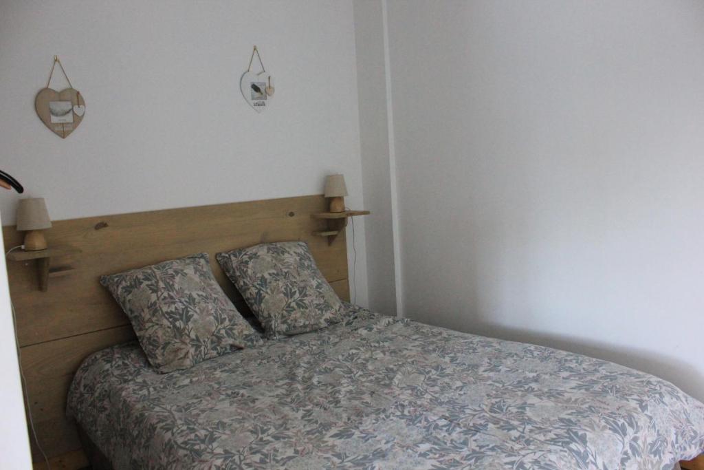 Postel nebo postele na pokoji v ubytování Le Moulin Traffay