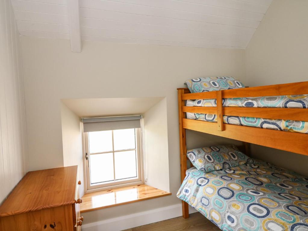 Postel nebo postele na pokoji v ubytování Yew Tree House