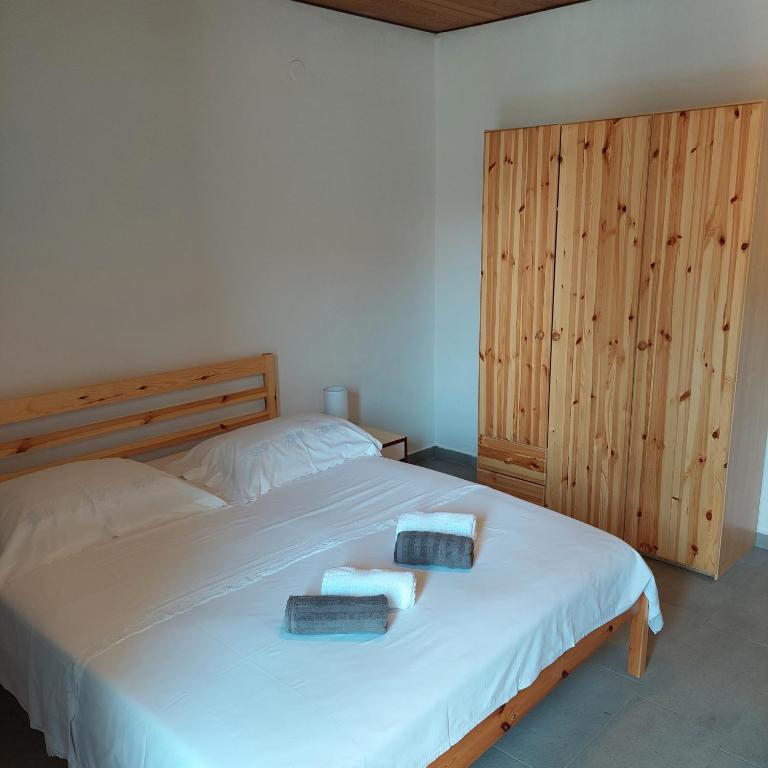 Posteľ alebo postele v izbe v ubytovaní Apartmani Origo