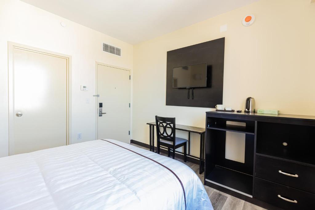 Kuchyň nebo kuchyňský kout v ubytování Astoria Inn LaGuardia Hotel