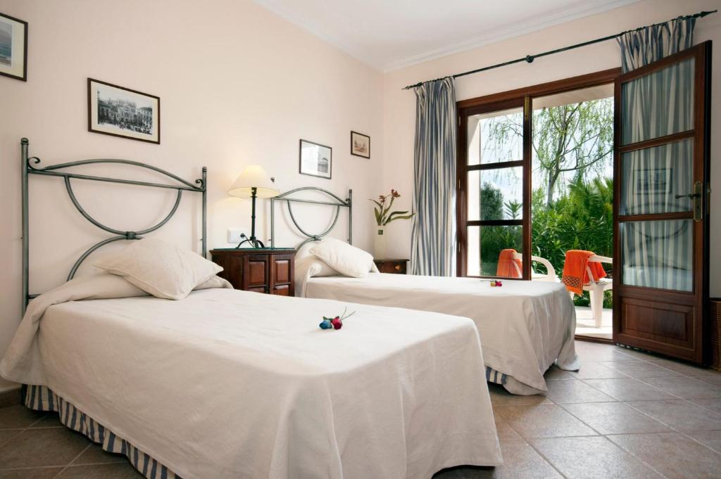 Postel nebo postele na pokoji v ubytování Villa Marino by Villa Plus