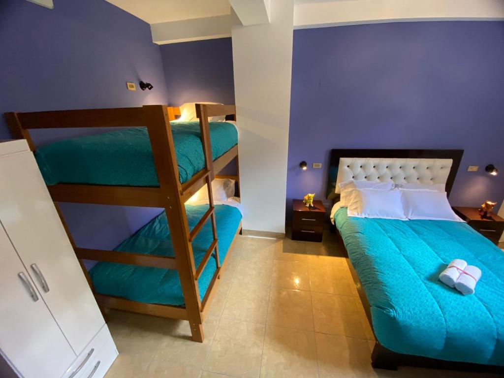 Postel nebo postele na pokoji v ubytování BROTHERs HOUSE
