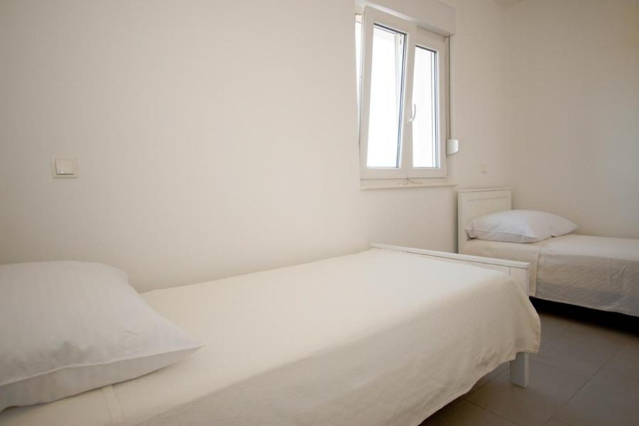 Postel nebo postele na pokoji v ubytování Nika Patricia