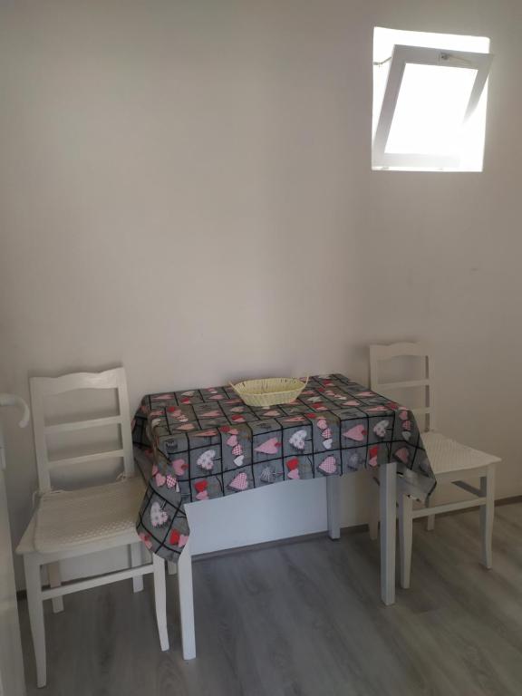 Postel nebo postele na pokoji v ubytování Apartman LEO