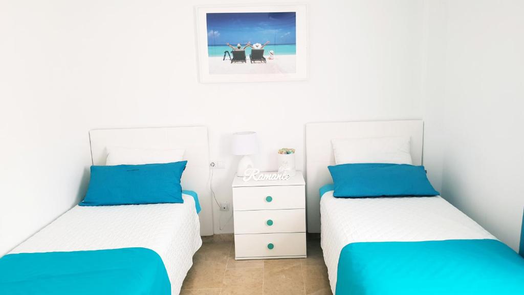 Postel nebo postele na pokoji v ubytování Ocean Romance (Duplex)