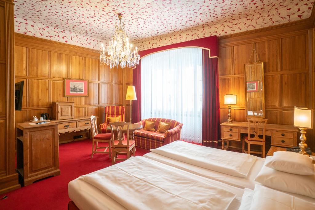 Postel nebo postele na pokoji v ubytování Hotel König von Ungarn