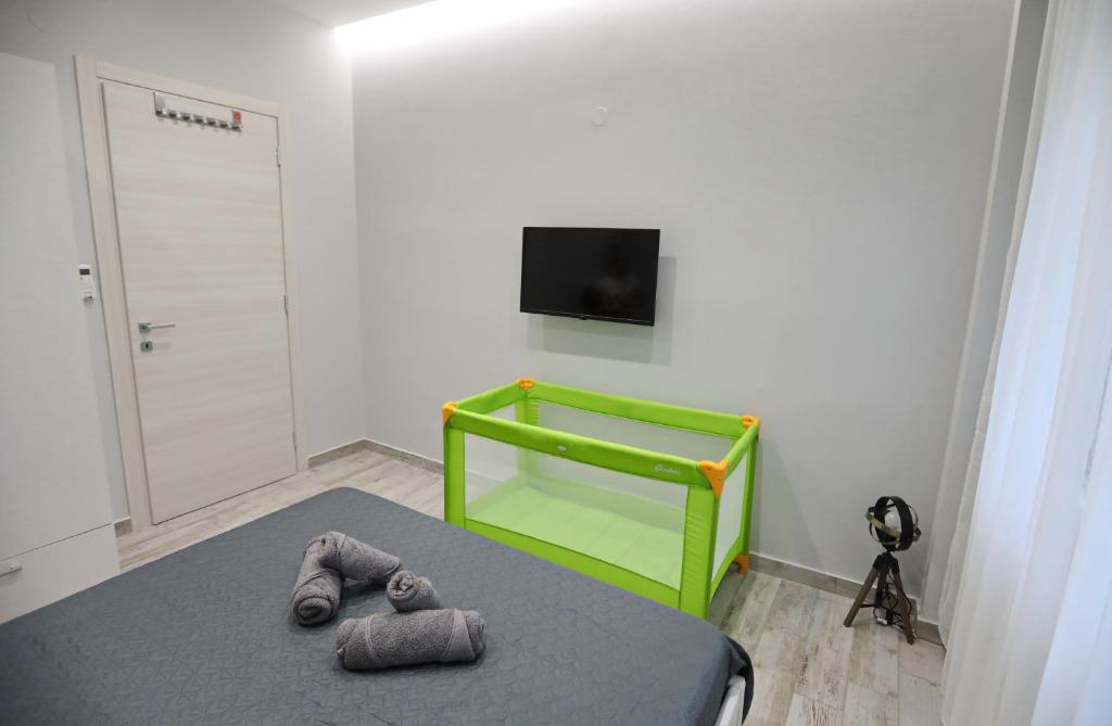 Televízia a/alebo spoločenská miestnosť v ubytovaní Terranova