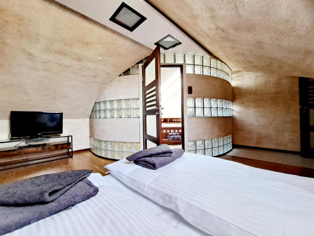 Posteľ alebo postele v izbe v ubytovaní OASIS APARTAMENT GIŻYCKO