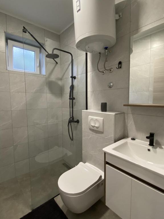 Kúpeľňa v ubytovaní Apartment & Rooms - Marina