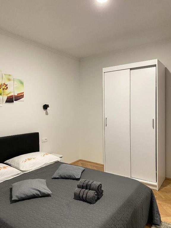 Posteľ alebo postele v izbe v ubytovaní Apartment & Rooms - Marina
