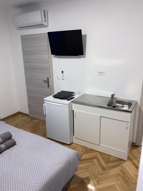 Kuchyňa alebo kuchynka v ubytovaní Apartment & Rooms - Marina