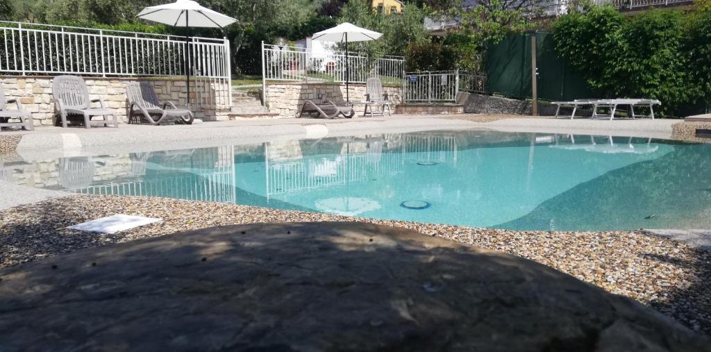 The swimming pool at or near Villa Le Statue
