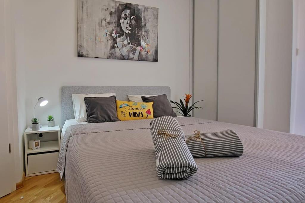 Uma cama ou camas num quarto em Apartment Summer Vibes Split