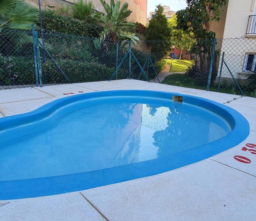 Bazén v ubytovaní Cosy and Modern Apartment in Fuengirola alebo v jeho blízkosti