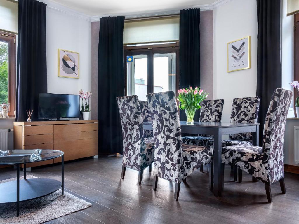 Televízia a/alebo spoločenská miestnosť v ubytovaní CracWoW VIP Apartment