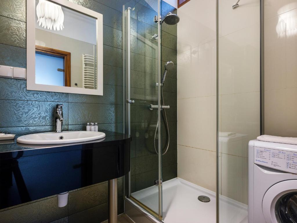 Kúpeľňa v ubytovaní CracWoW VIP Apartment