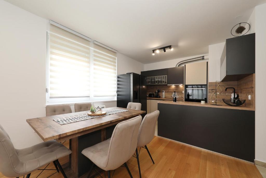Kuchyňa alebo kuchynka v ubytovaní Apartman Maresa