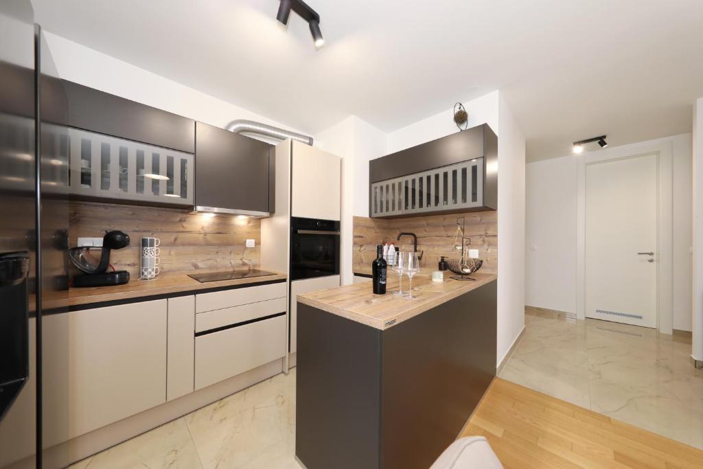 Kuchyňa alebo kuchynka v ubytovaní Apartman Maresa