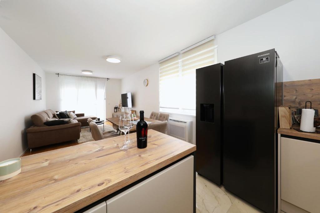 Kuchyňa alebo kuchynka v ubytovaní Apartman Maresa