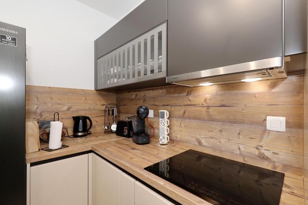Kuchyňa alebo kuchynka v ubytovaní Apartman Maresa