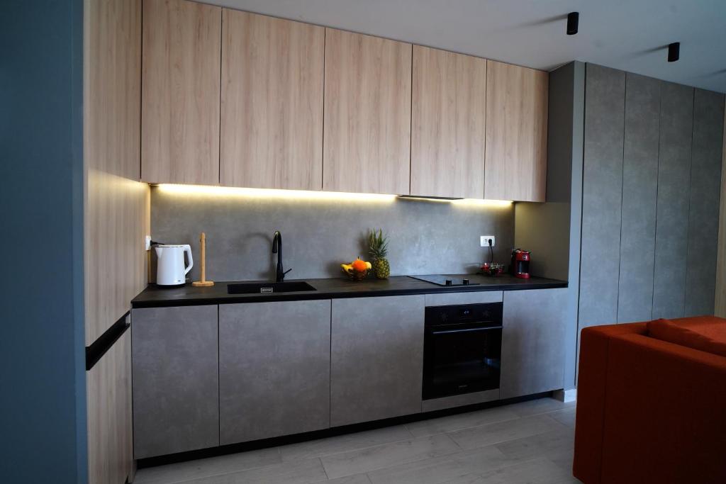 Kuchyň nebo kuchyňský kout v ubytování Solis Apartments Bol