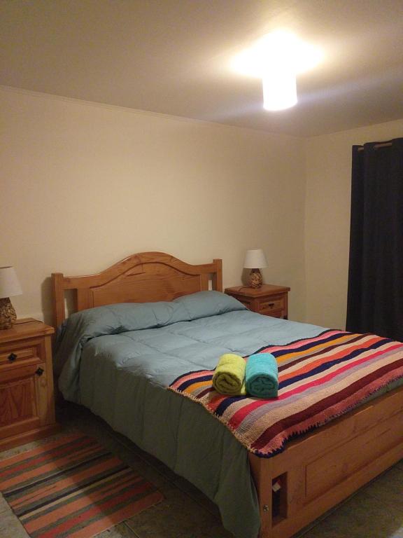 Postel nebo postele na pokoji v ubytování Hostal Ayni