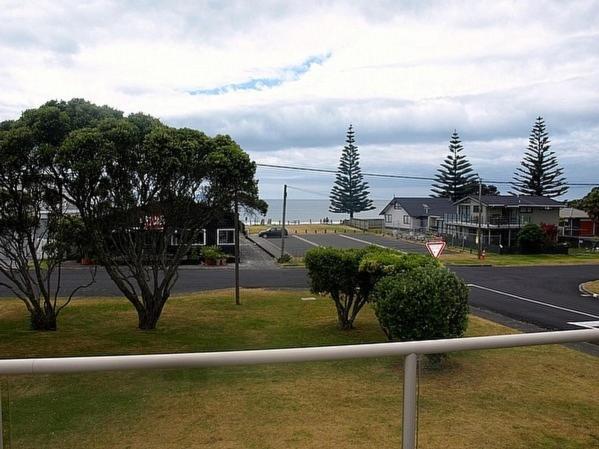 a view of a street with trees and a road at Waihi Beach Break - Waihi Beach Bach in Waihi Beach
