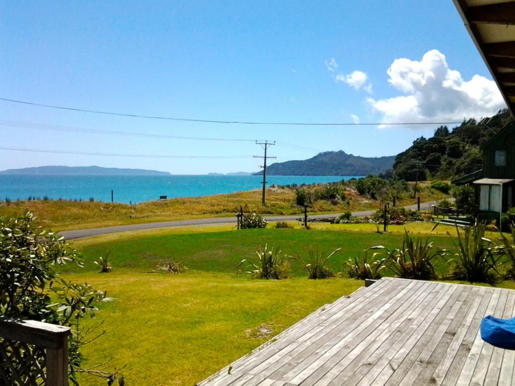 Beachfront Bach Rings Beach Bach, Matarangi (updated prices 2024)