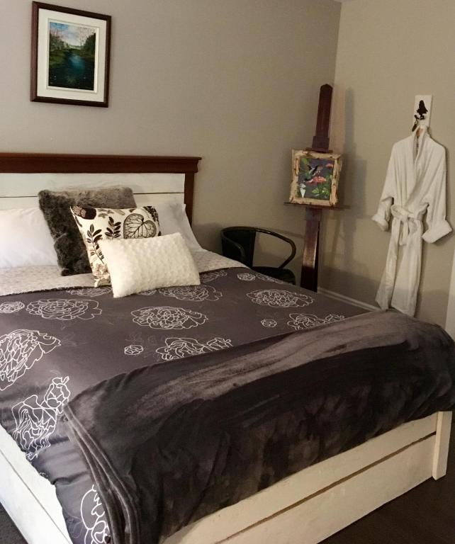 Postel nebo postele na pokoji v ubytování Au Gré Du Temps - Gîte B&B