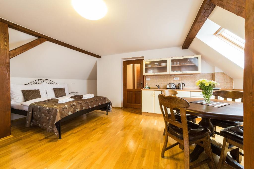 Postel nebo postele na pokoji v ubytování Vila Krumlov