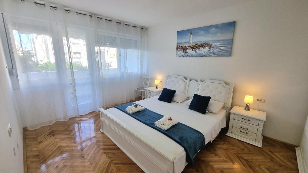 Posteľ alebo postele v izbe v ubytovaní Apartment Diocletian