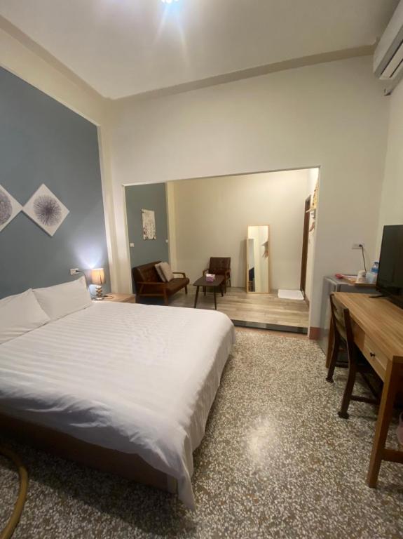 Katil atau katil-katil dalam bilik di Freedom B&B