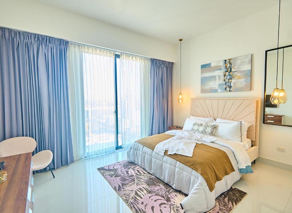 Postel nebo postele na pokoji v ubytování Torre Mónaco Xll Piantini
