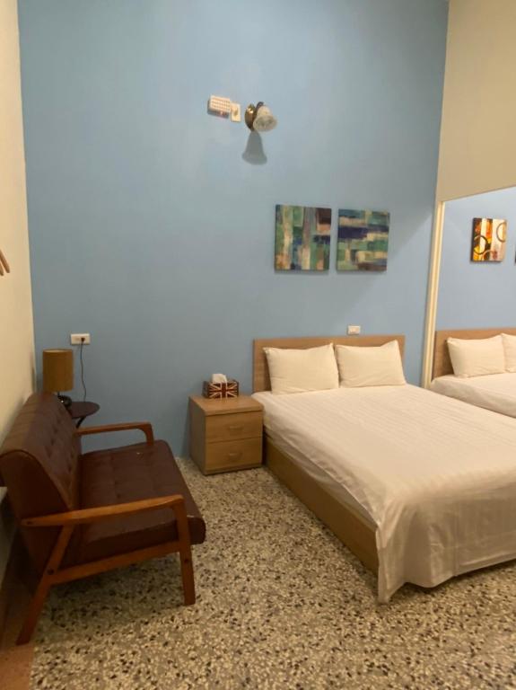 Katil atau katil-katil dalam bilik di Freedom B&B