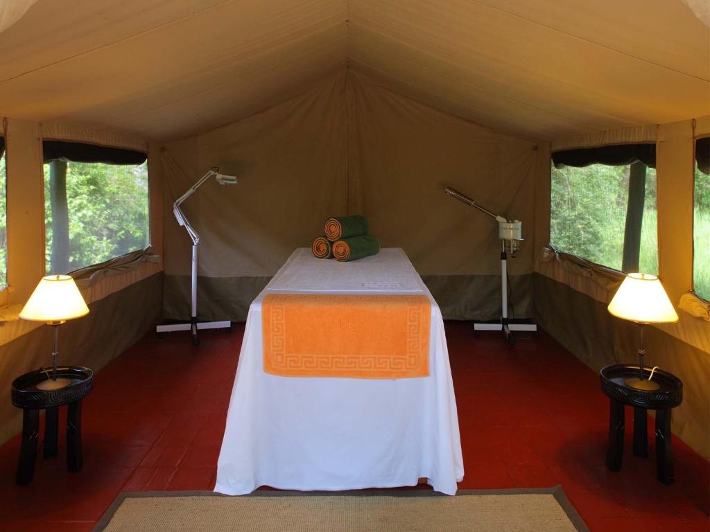 Voodi või voodid majutusasutuse Sarova Mara Game Camp toas