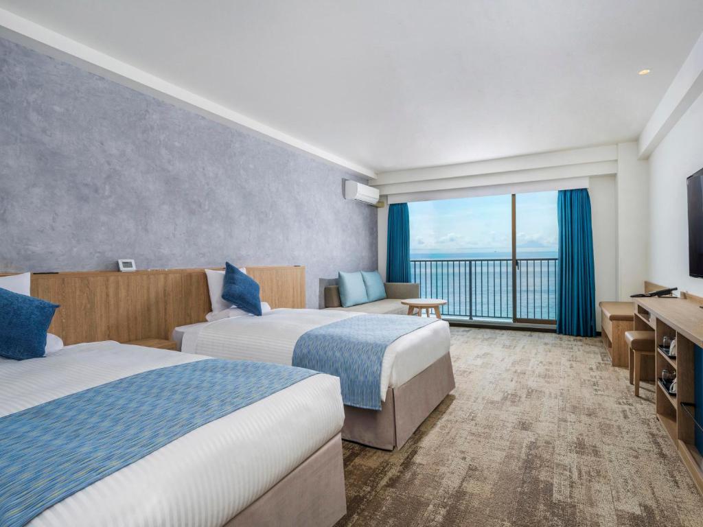 Postel nebo postele na pokoji v ubytování Atagawa Ocean Resort