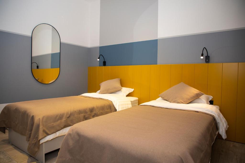 Postel nebo postele na pokoji v ubytování Maison