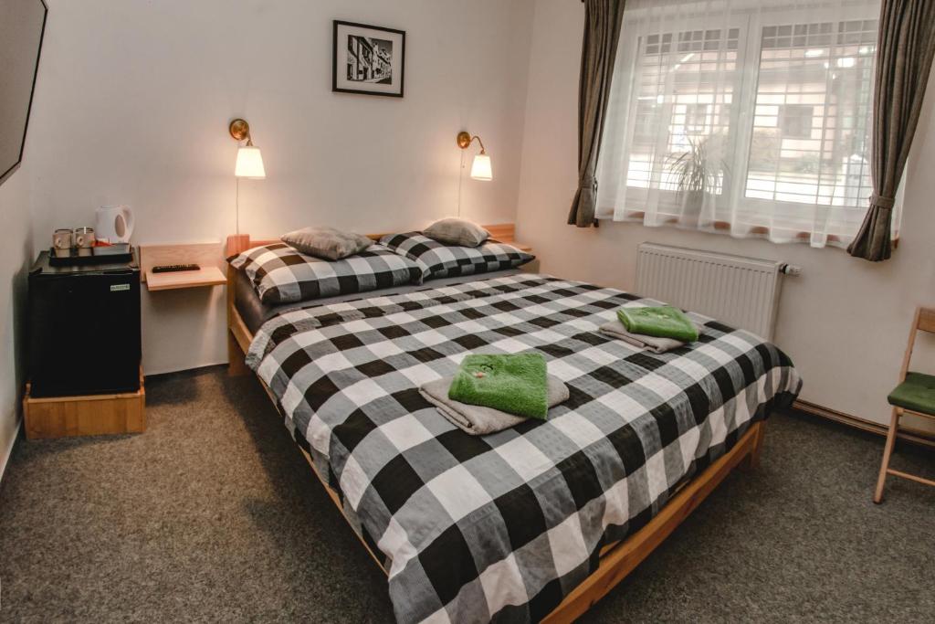 Postel nebo postele na pokoji v ubytování Pension Franko