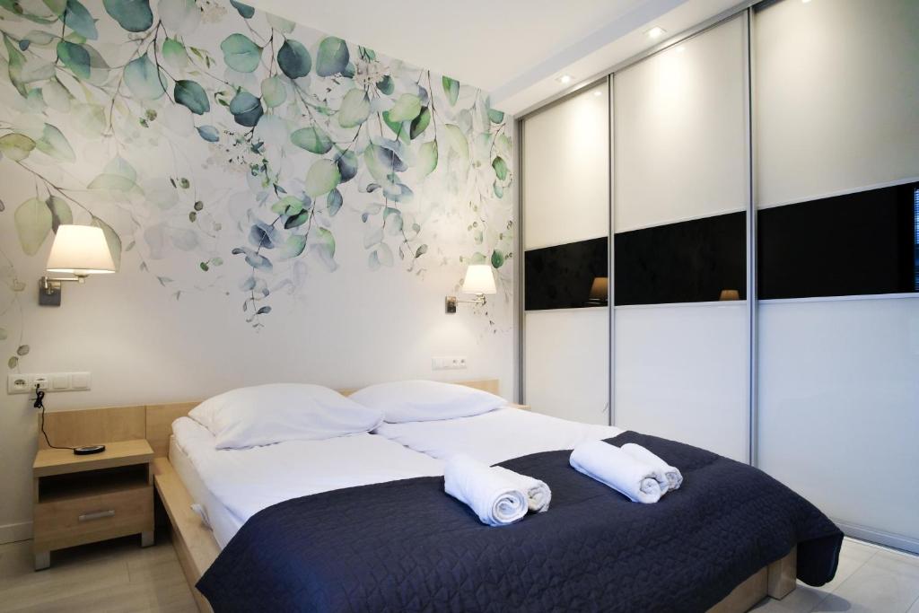 Postel nebo postele na pokoji v ubytování Sopot Apartament Aquarius