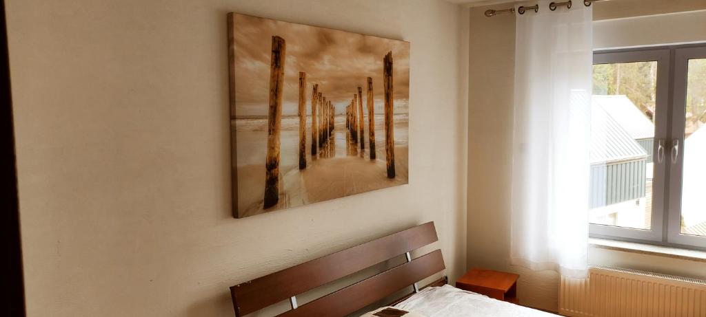 Posteľ alebo postele v izbe v ubytovaní Apartament przy plazy
