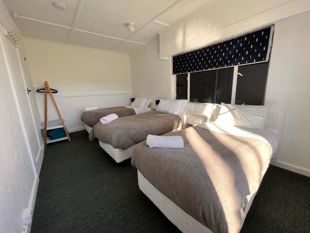 Postel nebo postele na pokoji v ubytování Smugglers Rest Apartments Dover