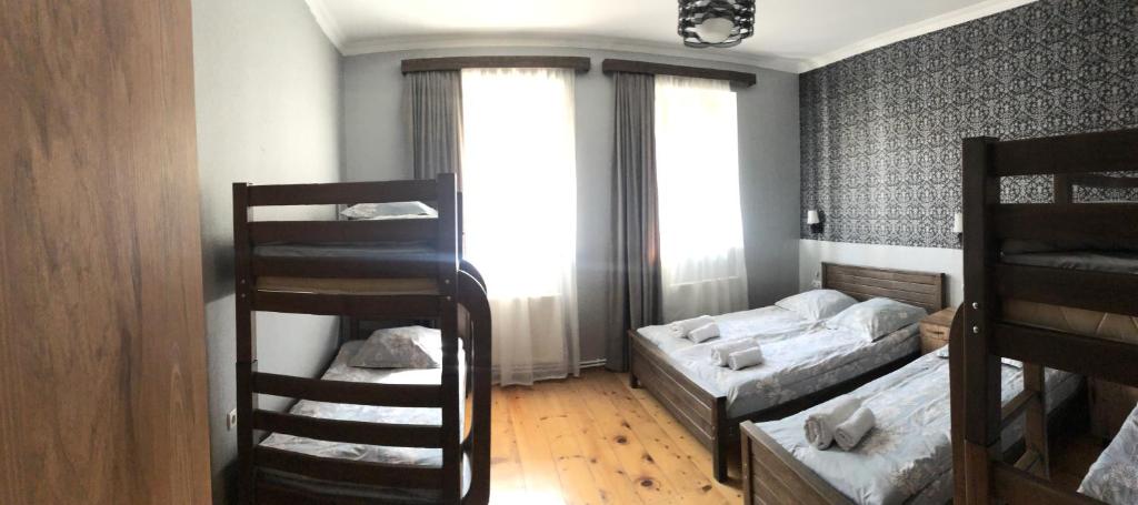 Postel nebo postele na pokoji v ubytování Hill House