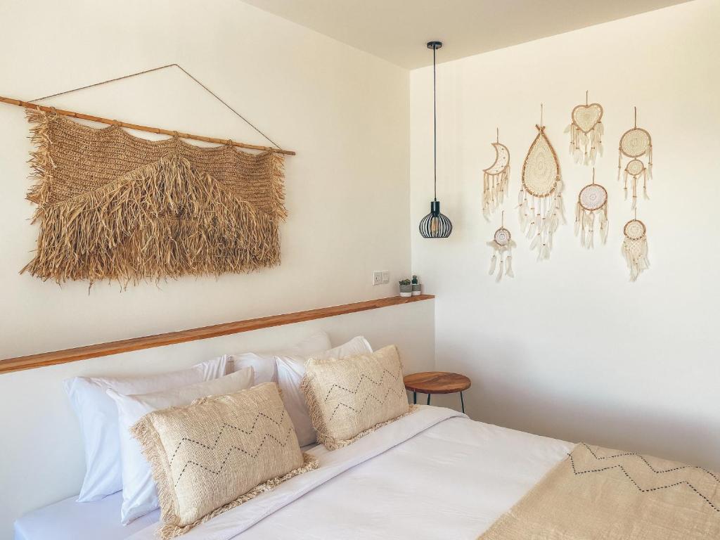 Postel nebo postele na pokoji v ubytování Arya Wellness - female only