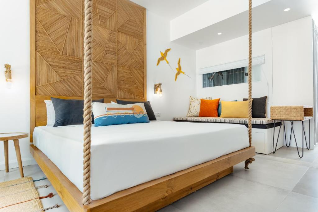 Кровать или кровати в номере Sunrise Attitude (Adults Only)