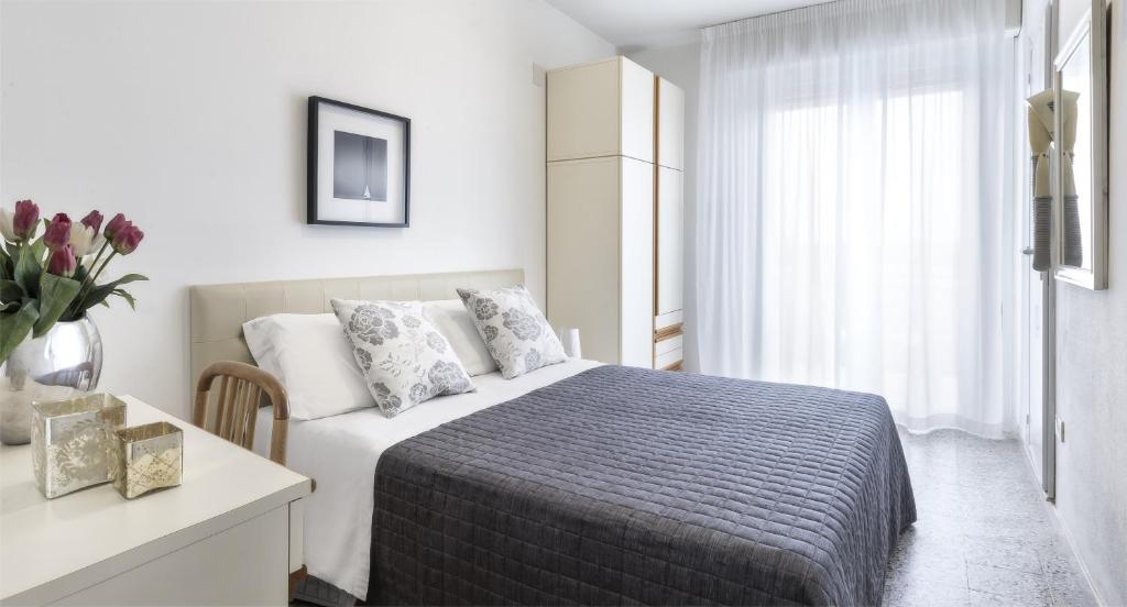 Postel nebo postele na pokoji v ubytování Hotel Carignano