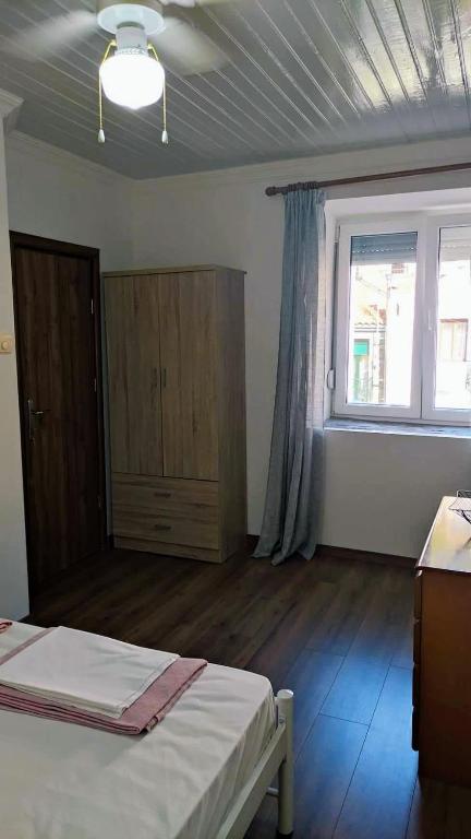 Postel nebo postele na pokoji v ubytování Vasilis traditional House